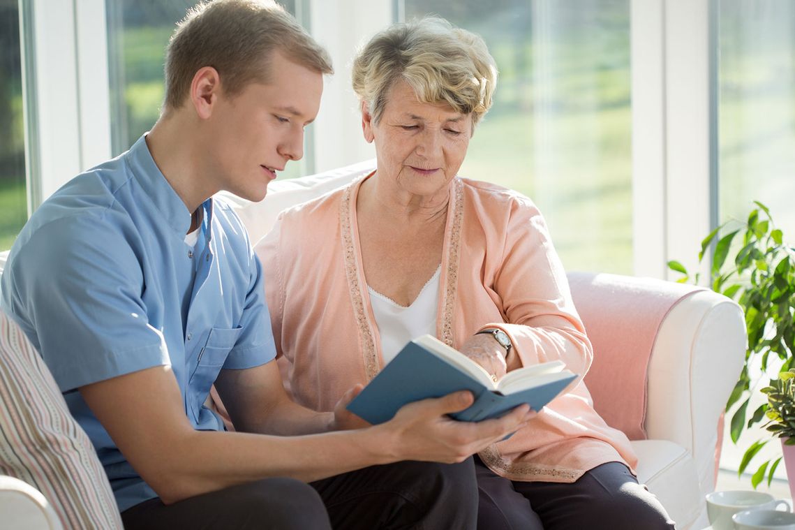 A career and a patient reading a book